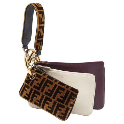 fendi triplette logo clutch bag|Fendi Pre.